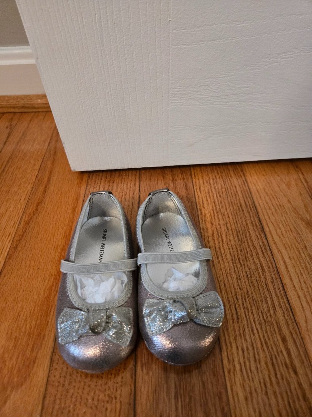 Brand new Stuart Weitzman silver crib shoes size 4